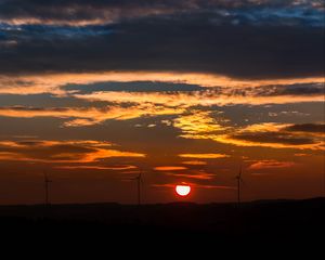 Preview wallpaper windmills, sunset, sky