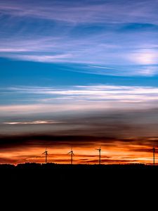 Preview wallpaper windmills, sunset, skyline, beautiful