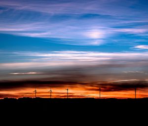 Preview wallpaper windmills, sunset, skyline, beautiful