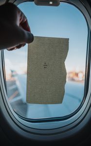 Preview wallpaper window, paper, inscription, porthole, hand