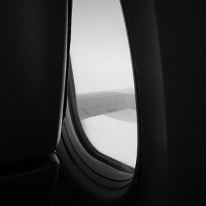 Preview wallpaper window, porthole, wing, view, darkness, black and white