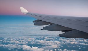 Preview wallpaper wing aircraft, clouds, flight, review