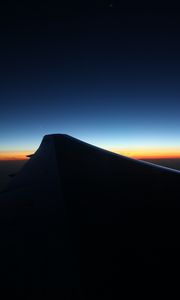 Preview wallpaper wing, dark, sky, twilight, horizon, plane