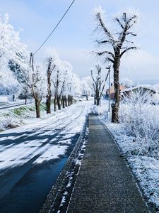 Preview wallpaper winter, city, road, street, snow