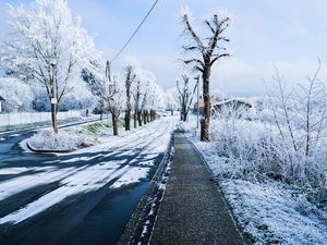 Preview wallpaper winter, city, road, street, snow