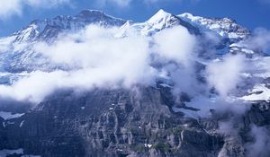 Preview wallpaper winter, mountains, fog, stones, gray, white