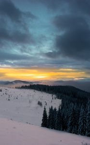 Preview wallpaper winter, mountains, forest, snow, sunset, sky, clouds, snowy