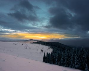Preview wallpaper winter, mountains, forest, snow, sunset, sky, clouds, snowy