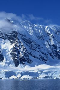 Preview wallpaper winter, mountains, ice, stones, cold, clouds