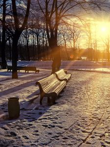 Preview wallpaper winter, park, sunset, bench, snow, sun