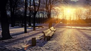 Preview wallpaper winter, park, sunset, bench, snow, sun