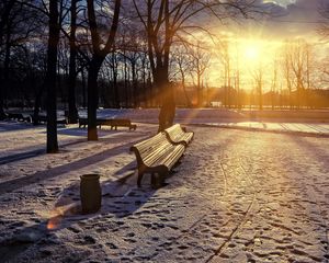 Preview wallpaper winter, park, sunset, bench, snow, sun