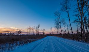 Preview wallpaper winter, road, trees, horizon, sky