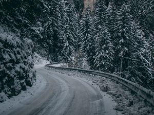 Preview wallpaper winter, road, turn, snow, branches, mountain