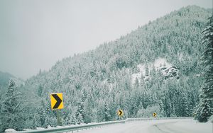 Preview wallpaper winter, signs, forest, trees, turn, mountains