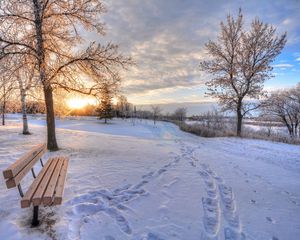 Preview wallpaper winter, snow, dawn, footprints, bench