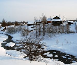 Preview wallpaper winter, snow, house, small river, bushes, tranquillity