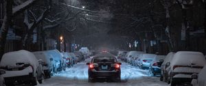 Preview wallpaper winter, street, car, movement, night, branches, trees