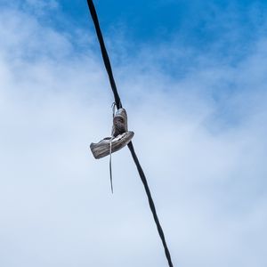 Preview wallpaper wire, sneakers, shoes, sky, clouds