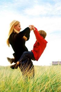 Preview wallpaper woman, boy, grass, sky, joy