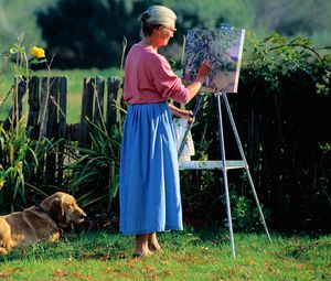 Preview wallpaper women, elderly, drawing, painting, canvas, dog, grass, leisure
