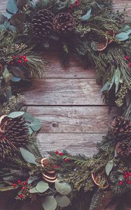 Preview wallpaper wreath, needles, cones, berries, wood, new year, christmas