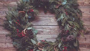 Preview wallpaper wreath, needles, cones, berries, wood, new year, christmas