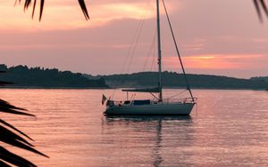 Preview wallpaper yacht, water, sunset, sea, bay, shore