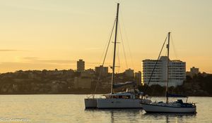 Preview wallpaper yachts, boats, city, buildings, dawn