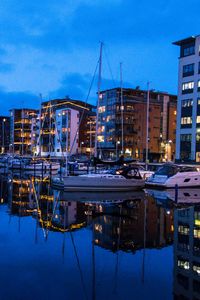 Preview wallpaper yachts, buildings, lights, reflection, water, bay, evening