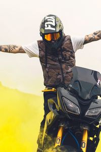 Preview wallpaper yamaha, motorcycle, motorcyclist, helmet, gesture, smoke, yellow