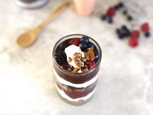 Preview wallpaper yogurt, raspberries, blueberries, blackberries, nuts, chocolate