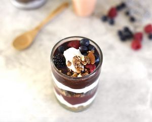 Preview wallpaper yogurt, raspberries, blueberries, blackberries, nuts, chocolate